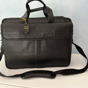 Dell Black Laptop Bag with Detachable Strap and Zipper Closure